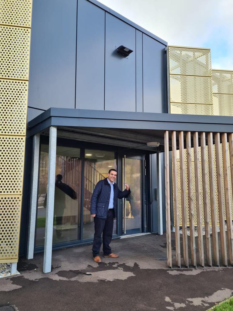 Youssef With Keys to Apex Facility